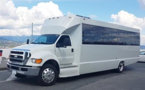 white luxury limo bus
